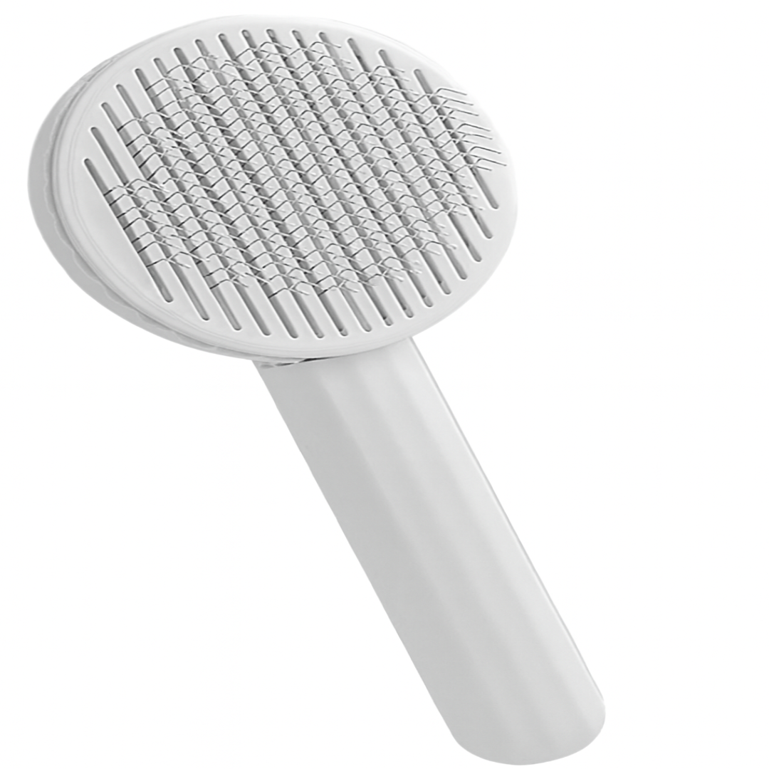 White handheld brush with textured head on a white background